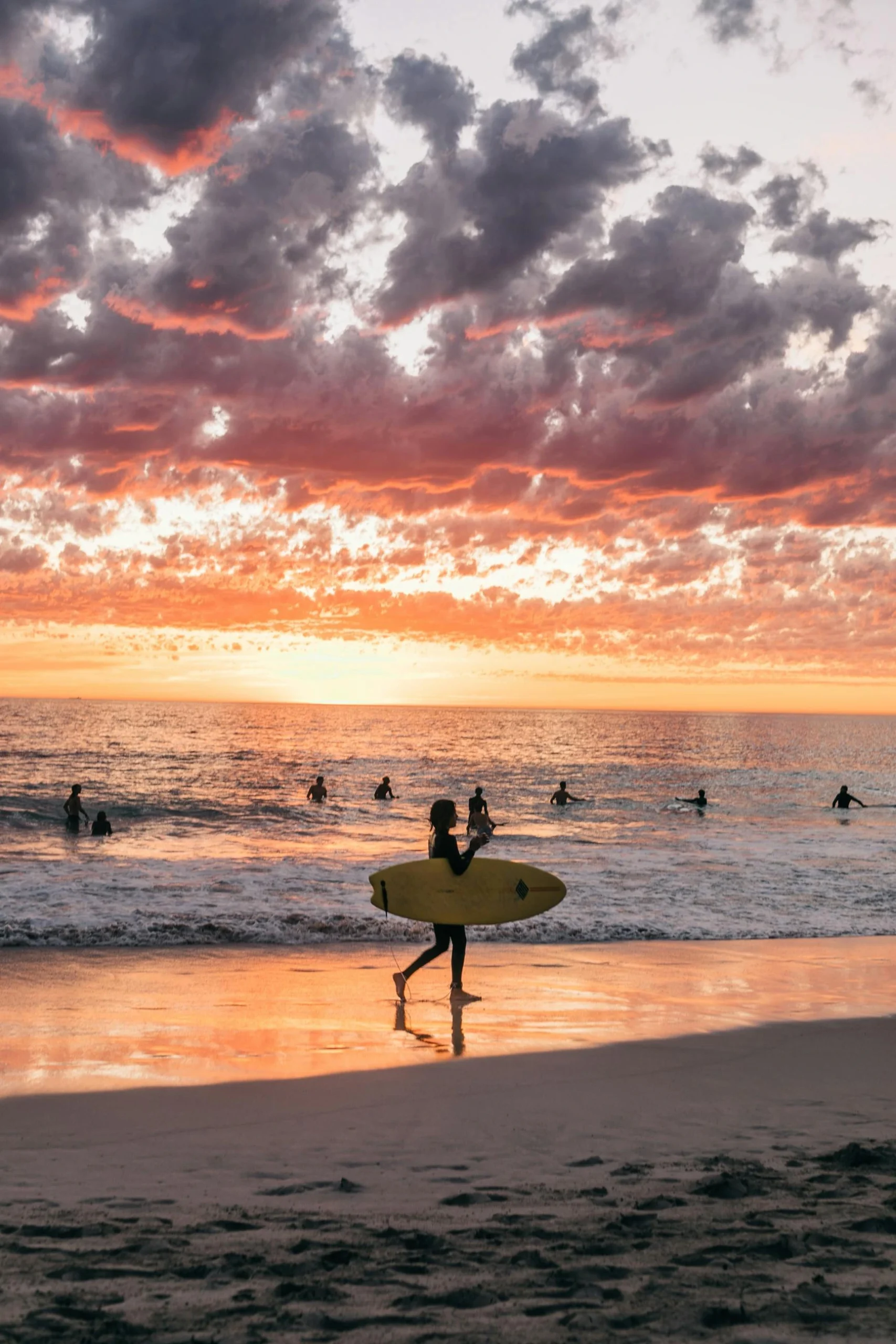 Surfer at sunset in Unawatuna